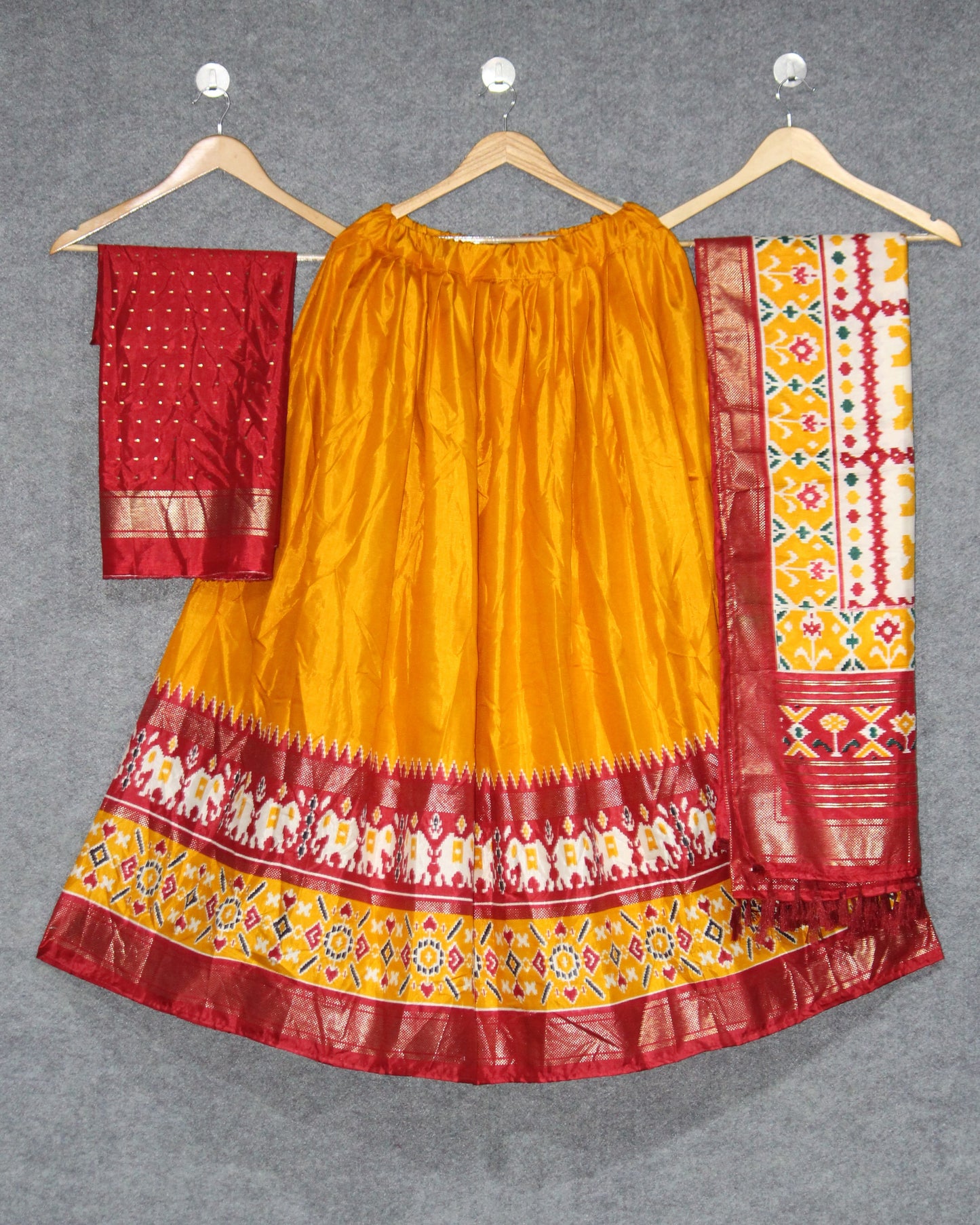Elevate Your Navratri Look with This Printed Silk Lehenga Choli – A Masterpiece of Style & Mirror Work
