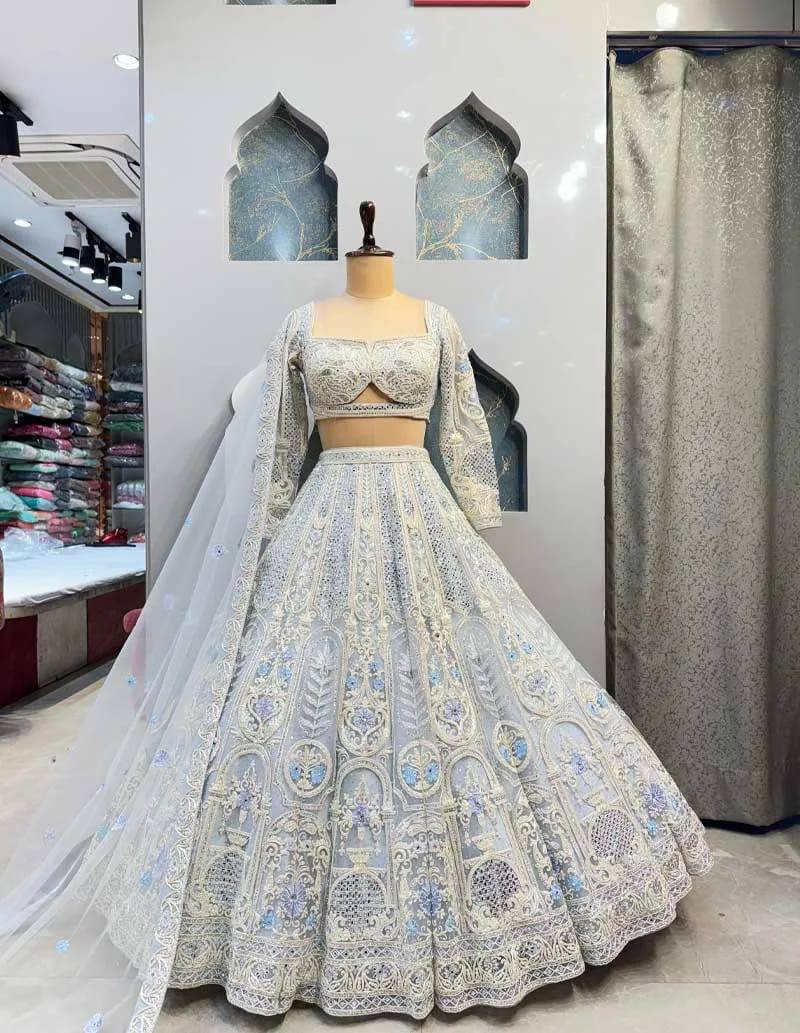 Radiate festive brilliance with our Zareen Glam Faux Georgette Lehenga Choli Set