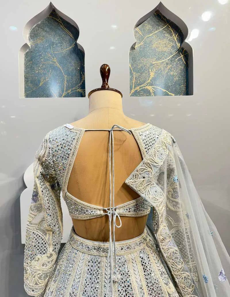 Radiate festive brilliance with our Zareen Glam Faux Georgette Lehenga Choli Set