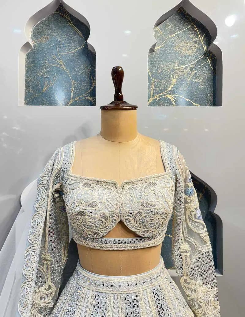 Radiate festive brilliance with our Zareen Glam Faux Georgette Lehenga Choli Set