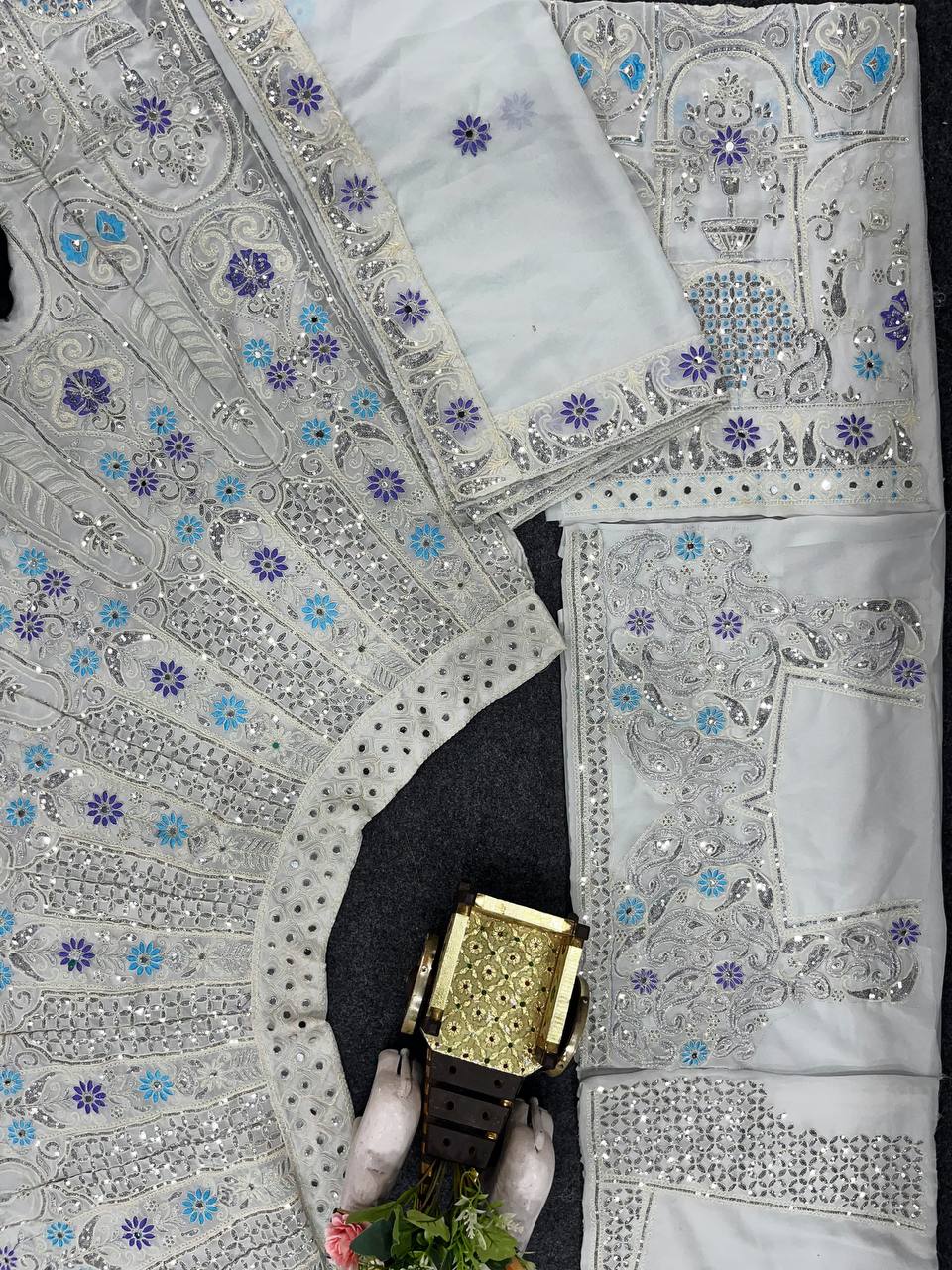 Radiate festive brilliance with our Zareen Glam Faux Georgette Lehenga Choli Set