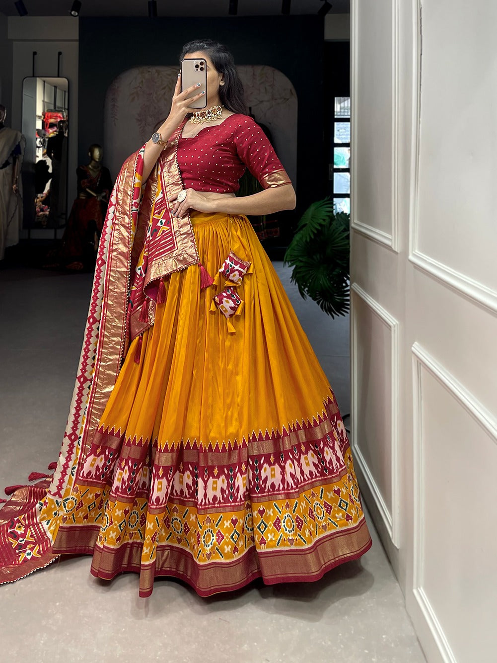 Elevate Your Navratri Look with This Printed Silk Lehenga Choli – A Masterpiece of Style & Mirror Work