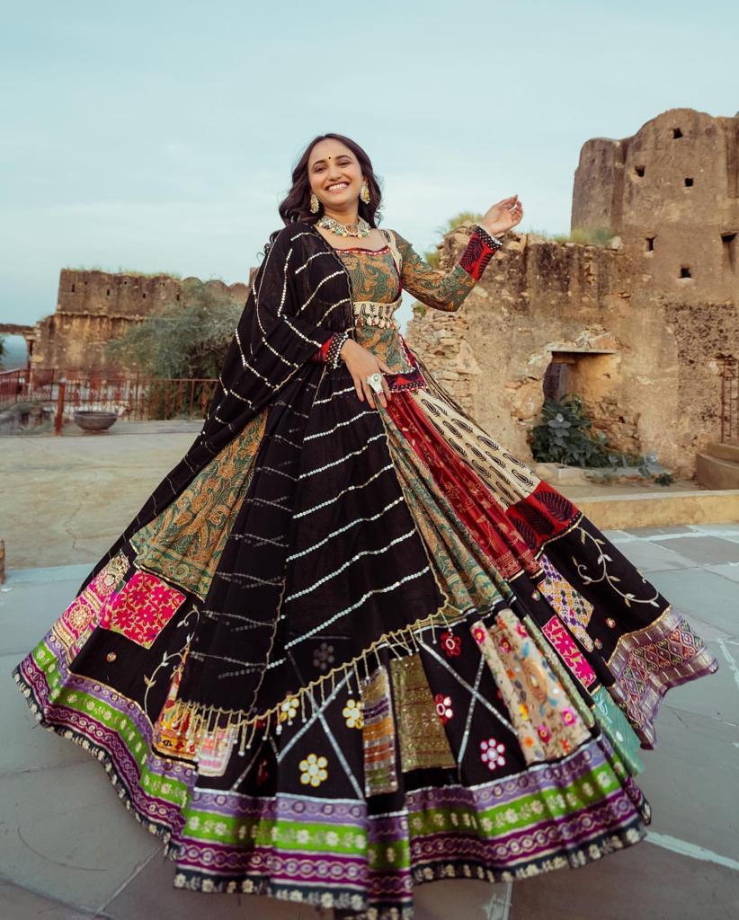 Celebrate Navratri Nights in this Elegant Chinon Silk Mirror Work Lehenga Choli