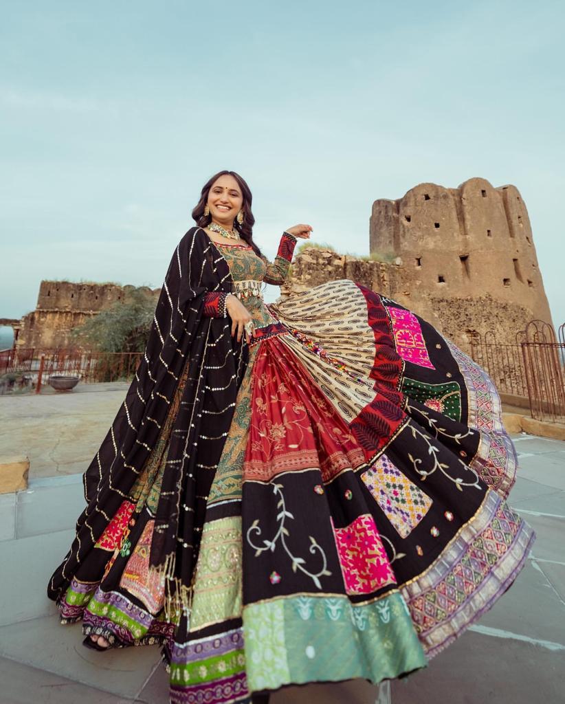 Celebrate Navratri Nights in this Elegant Chinon Silk Mirror Work Lehenga Choli