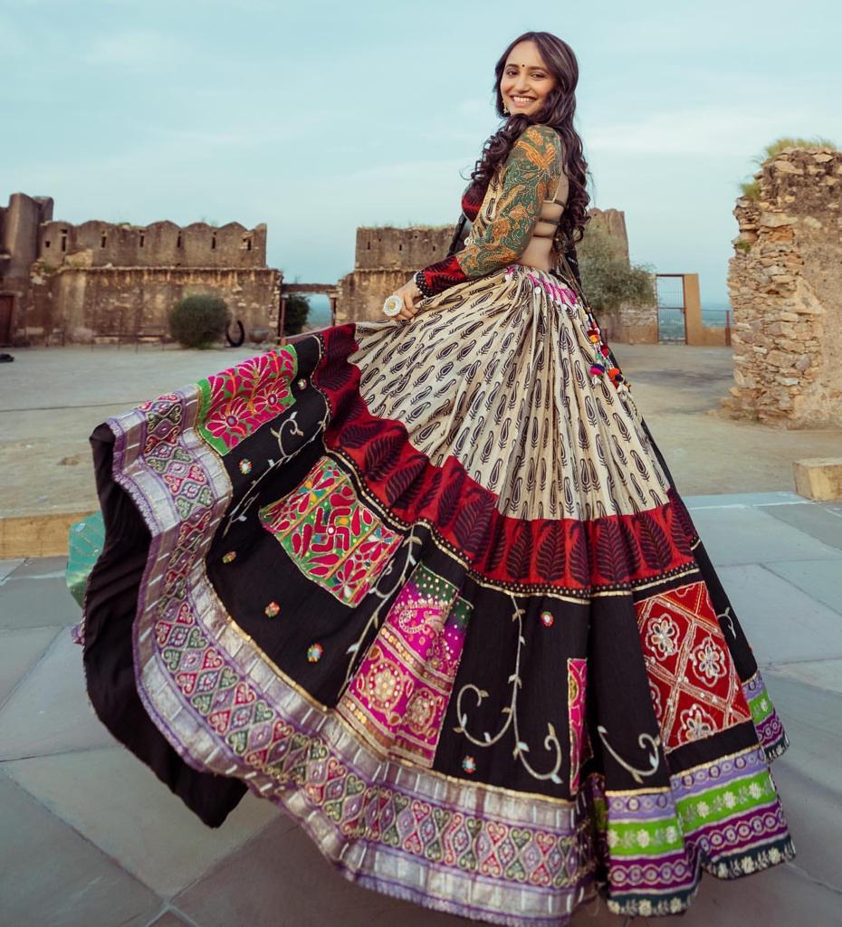 Celebrate Navratri Nights in this Elegant Chinon Silk Mirror Work Lehenga Choli