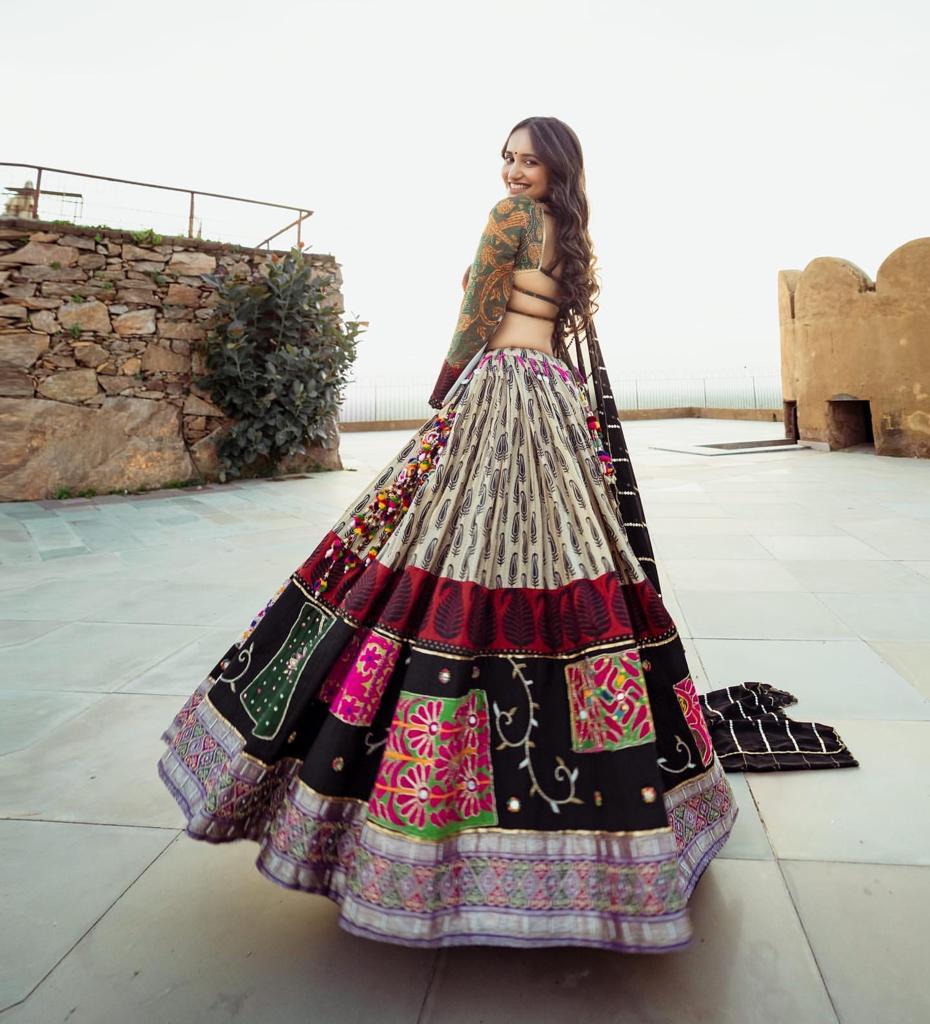 Celebrate Navratri Nights in this Elegant Chinon Silk Mirror Work Lehenga Choli